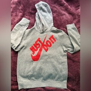 Nike Kids Gray Hoodie with Bold Red Graphic